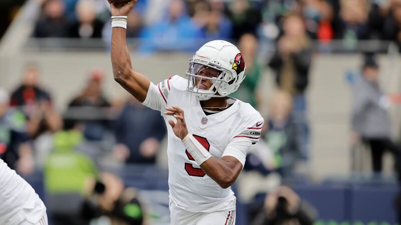 Arizona Cardinals quarterback Joshua Dobbs throws a pass against the Seattle Seahawks during...