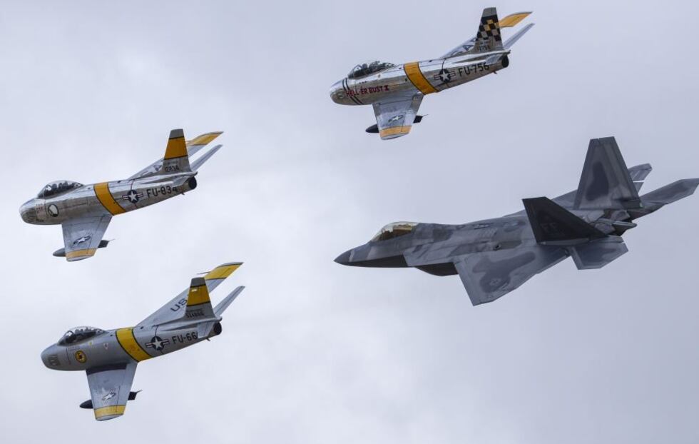 An F-22 and 3 F-86 Sabres. (Source: 355th Fighter Wing Public Affairs)