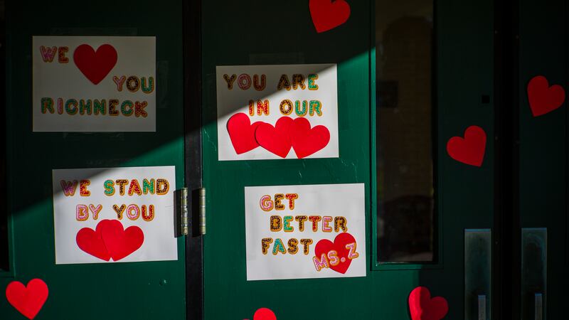 FILE - Messages of support for teacher Abby Zwerner, who was shot by a 6-year-old student,...