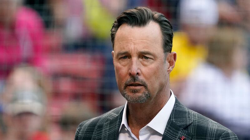FILE - Former Boston Red Sox player Tim Wakefield looks on before the start of a baseball game...