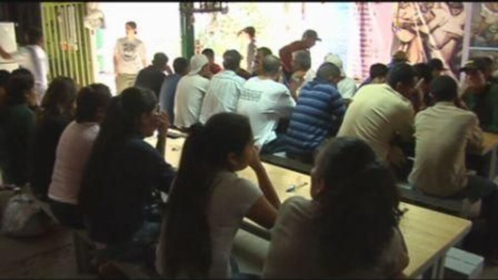Deportees rest and get food at a care center in Mexico, near the U.S. border