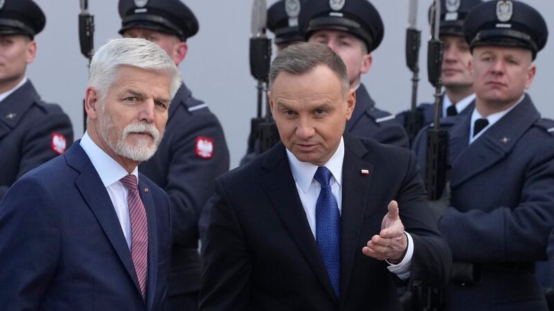 Poland's President Andrzej Duda, right, welcomes the Czech Republic's President Petr Pavel as...