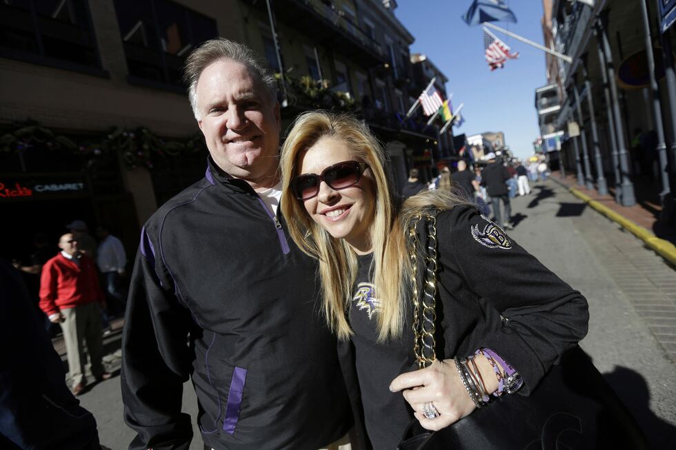FILE - Sean and Leigh Anne Tuohy, adoptive parents of Baltimore Ravens starting offensive...