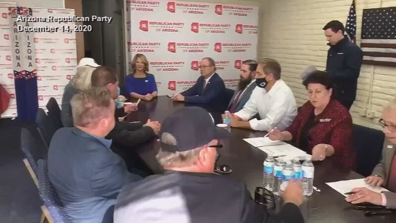 The group of Republican fake electors created their own certificate of the election and sent...