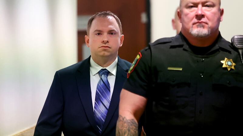 Aaron Dean arrives to the 396th District Court in Fort Worth on Monday, Dec. 5, 2022, in Fort...