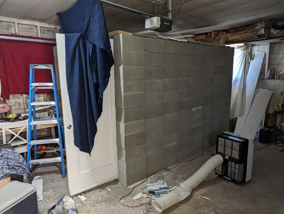 A woman said she escaped from a makeshift cell after being abducted.