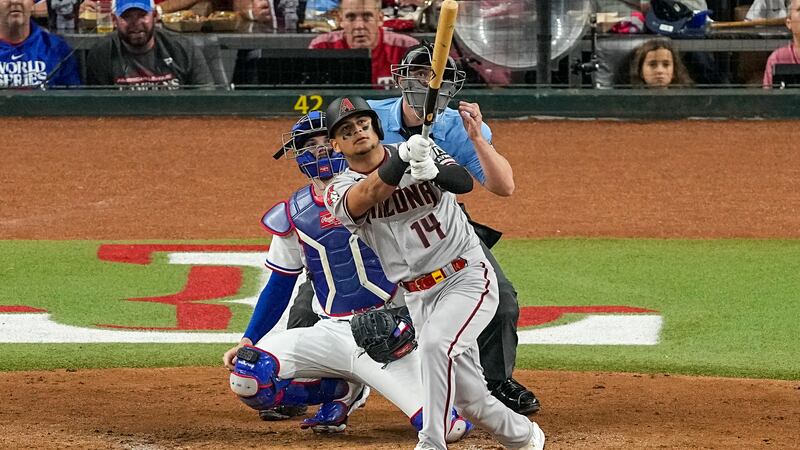 Arizona Diamondbacks' Gabriel Moreno watches his home run against the Texas Rangers during the...