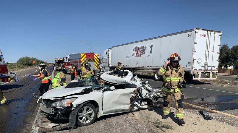 Firefighters with the Green Valley Fire Department respond to a crash on Interstate 19 on...