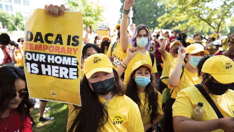 FILE - Susana Lujano, left, a "Dreamer" from Mexico who lives in Houston, joins other...