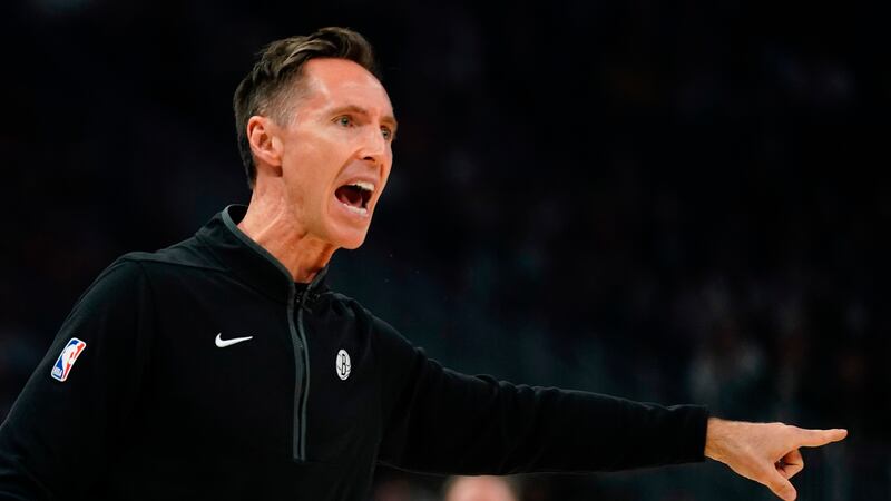 Brooklyn Nets head coach Steve Nash argues a call during the first half of an NBA basketball...